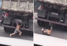 Criança senta na traseira de caminhão em movimento e quase é atropelada